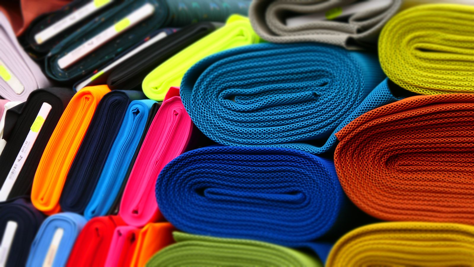 Rolls of colorful upholstery fabric